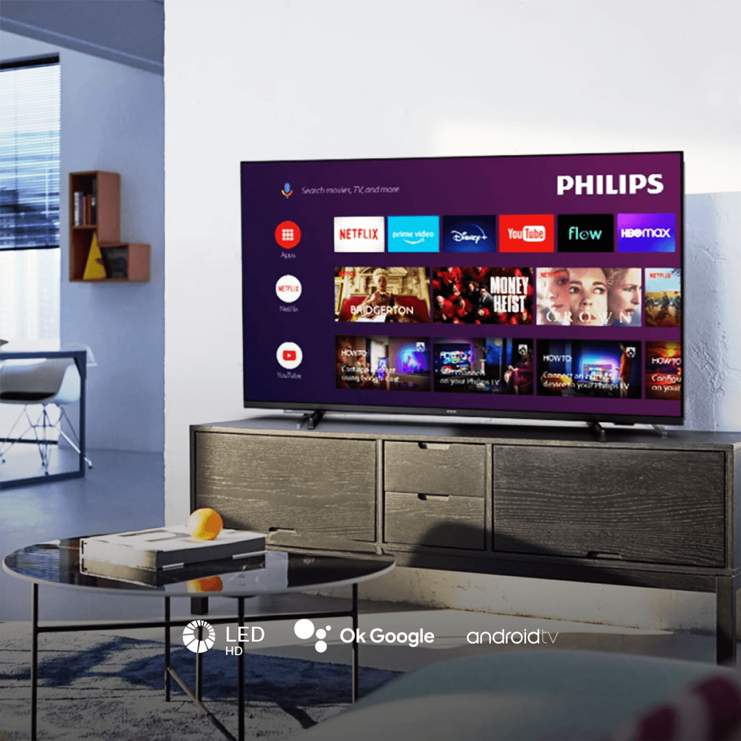Smart TV Philips 32PHD691877 de 32 pulgadas con Google TV sobre un mueble