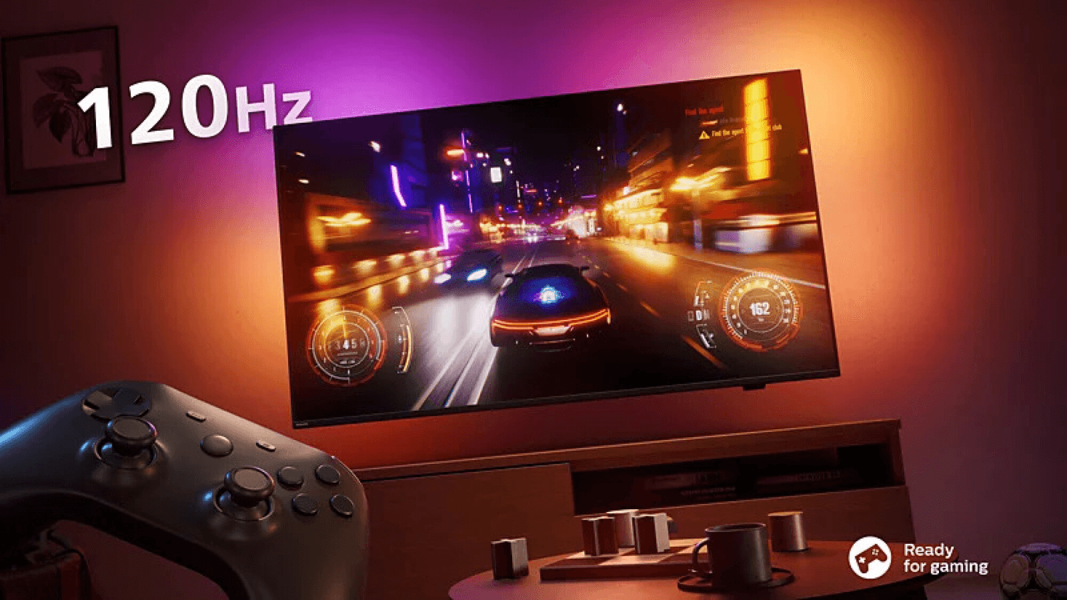 Philips 65OLED77977 con un juego de carreras en pantalla y un control de consola
