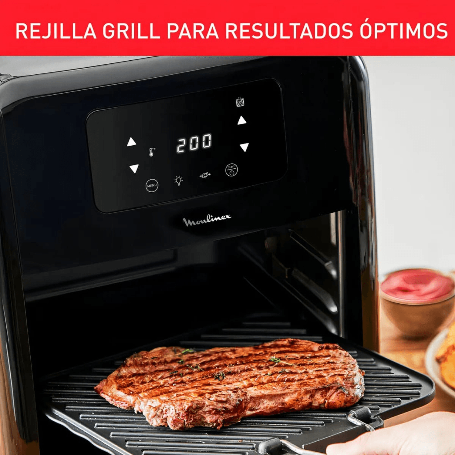 Parrilla de grill del Moulinex AL501810 con un bife