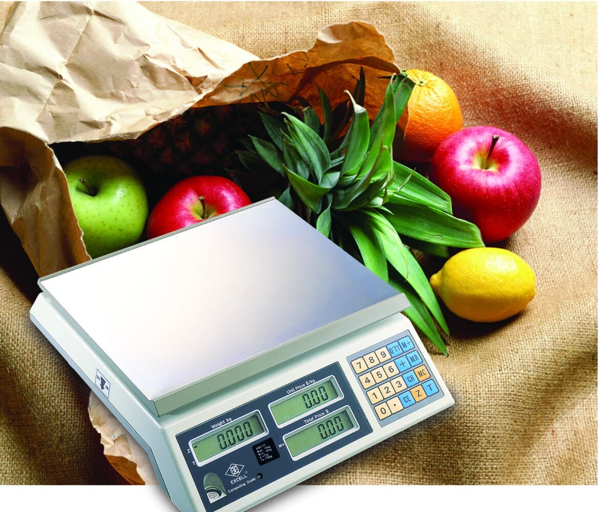 Balanza Jameco AM3 sobre el mostrador con frutas