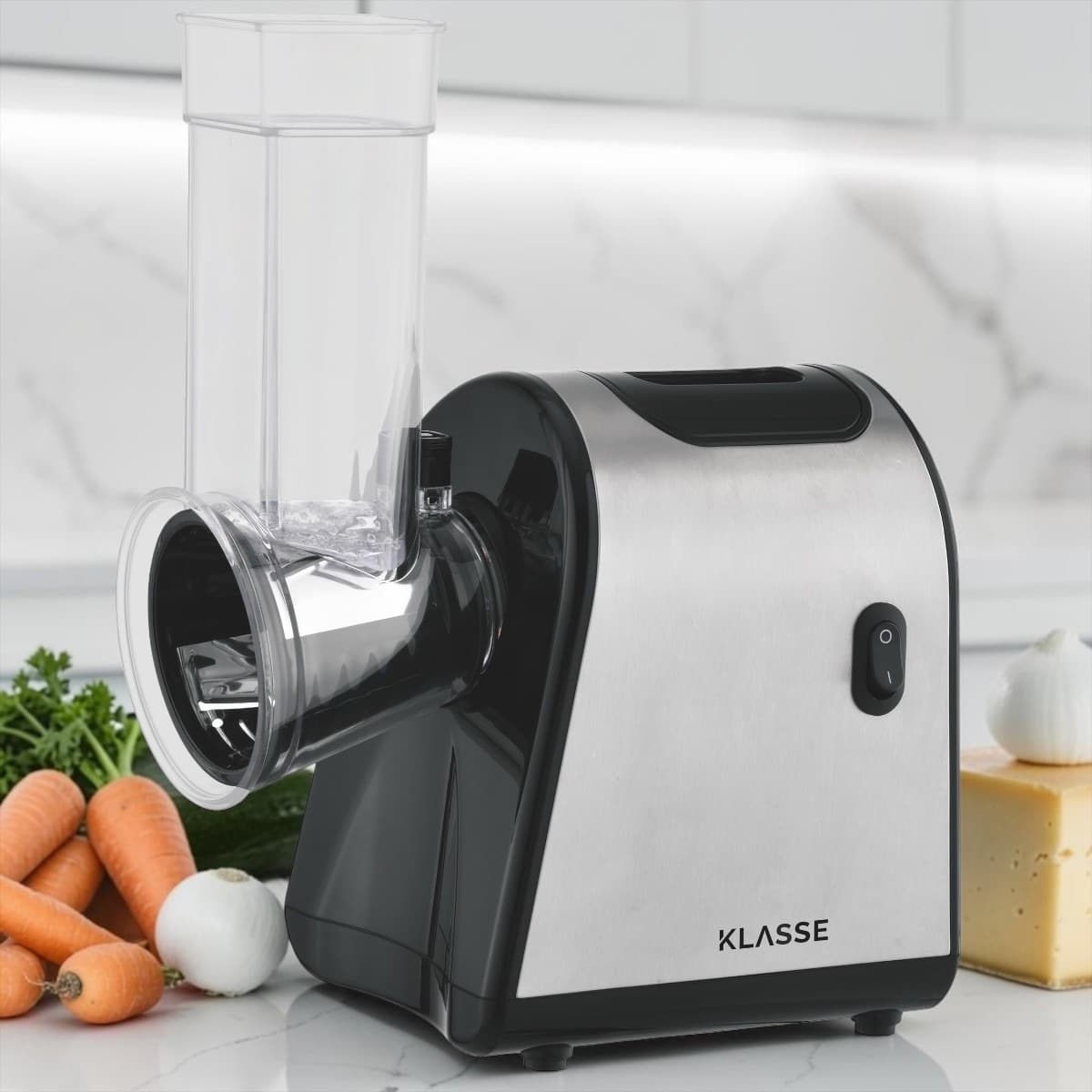 Rallador eléctrico Klasse KS4700 cortando verduras