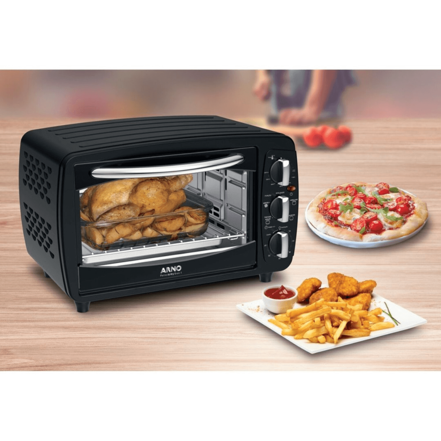 Horno Arno OF32B8B2 junto a pizza y papas fritas
