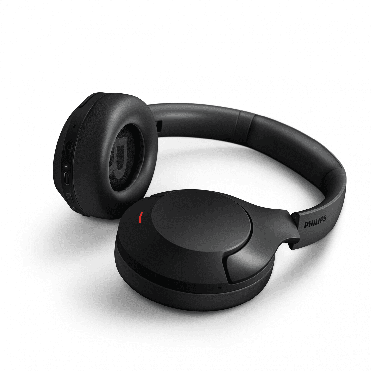Auriculares Philips TAH8507BK/00 apoyados