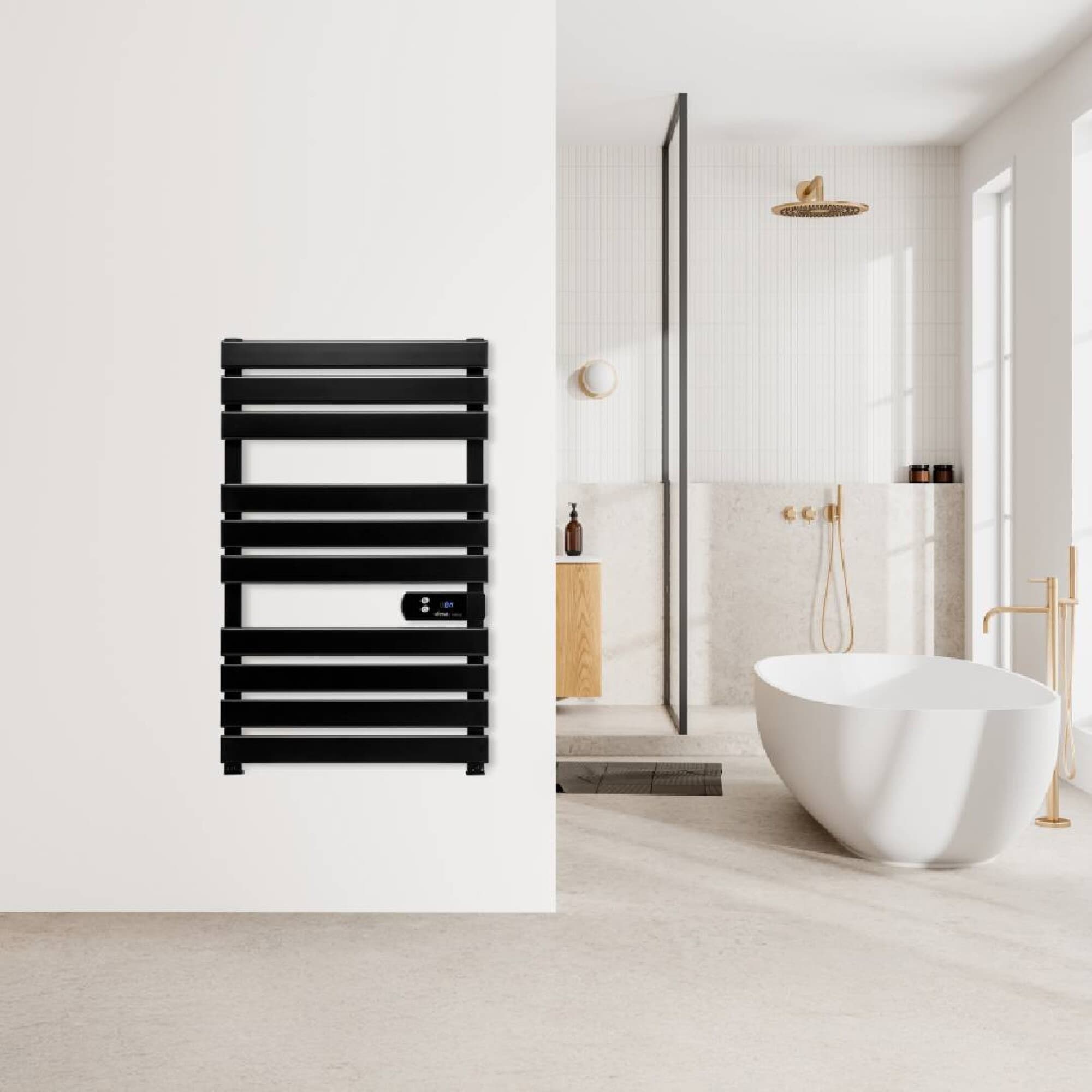 Toallero eléctrico Ufesa Helios colgado en la pared de un baño