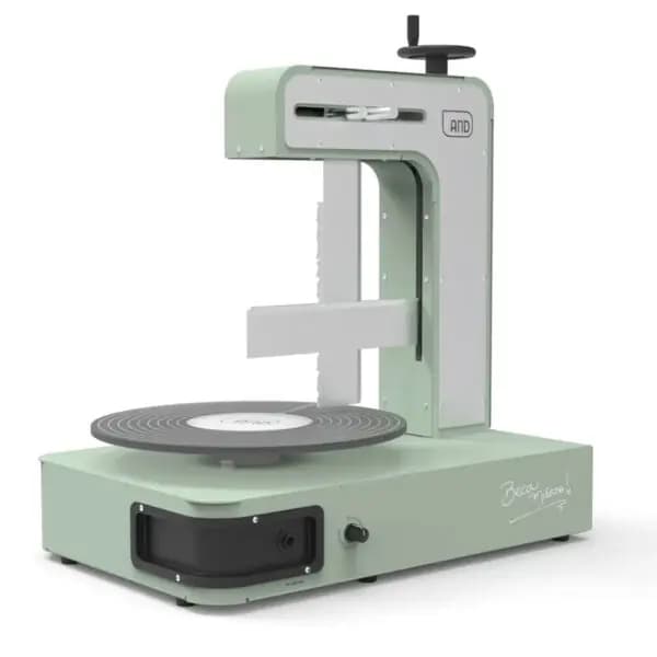 Niveladora de Cobertura de Tortas AND Baudin